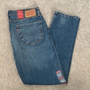 Levi's 502. 34x32. NWT. Light blue. Stone washed. Regular taper.